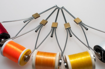 The bobbin holder The bobbin holder